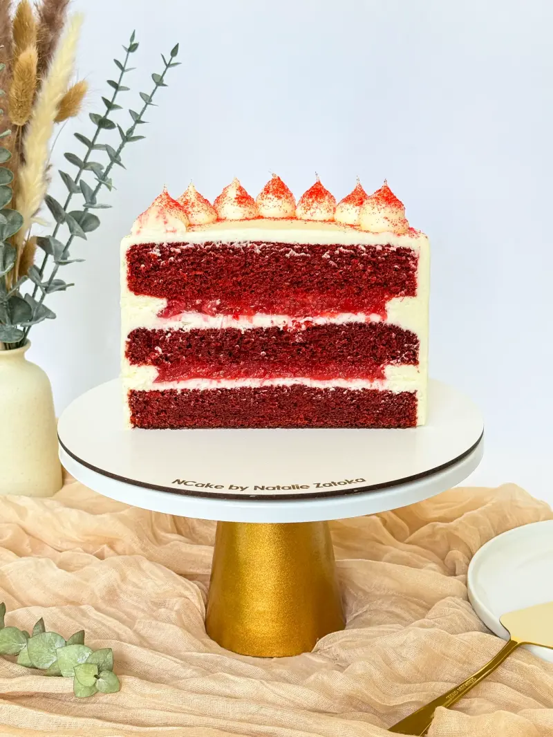 half of red velvet cake on the cake stand Active Image