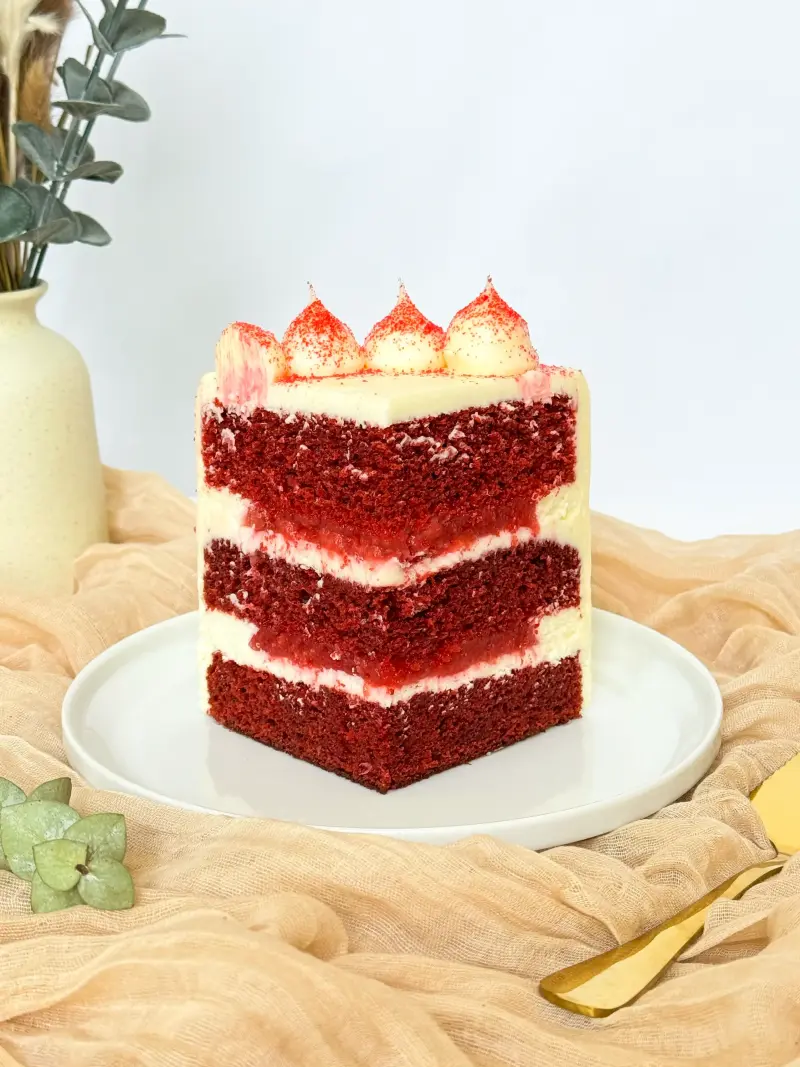 piece of red velvet cake on the cake plate Active Image