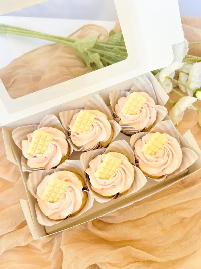 vanilla strawberry cupcakes in the box