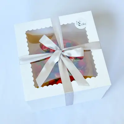 The cake is packed in a branded NCake box and is ready for delivery