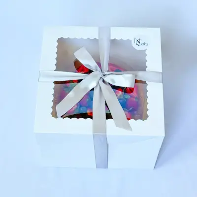 The cake is packed in a branded NCake box and is ready for delivery